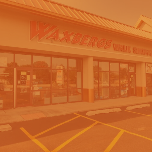 Image of Waxberg's Shoe Shoppe with an orange overlay