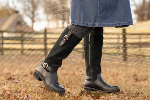 Lifestyle image of the Dansko Dawn Boot in black